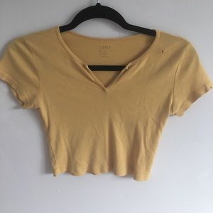 Yellow cropped shirt